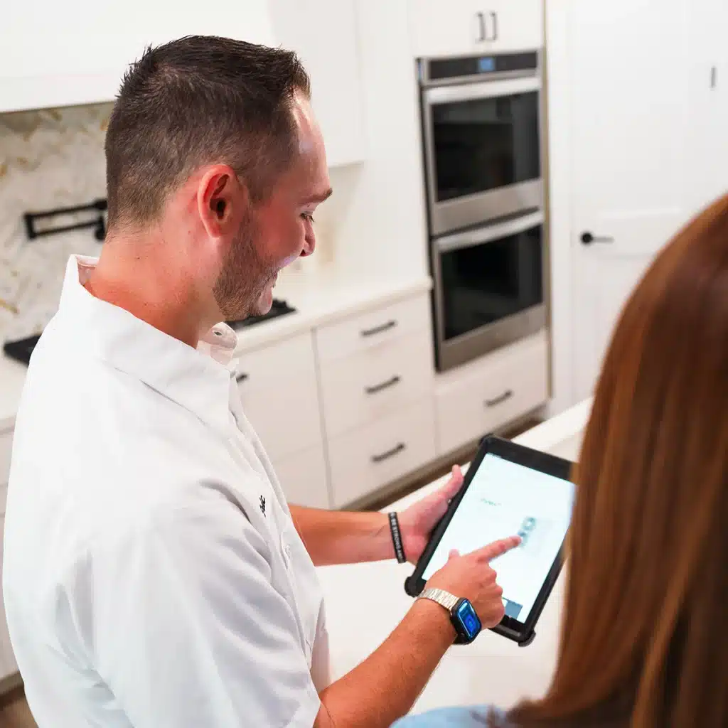 Pearce Technician providing service to homeowner