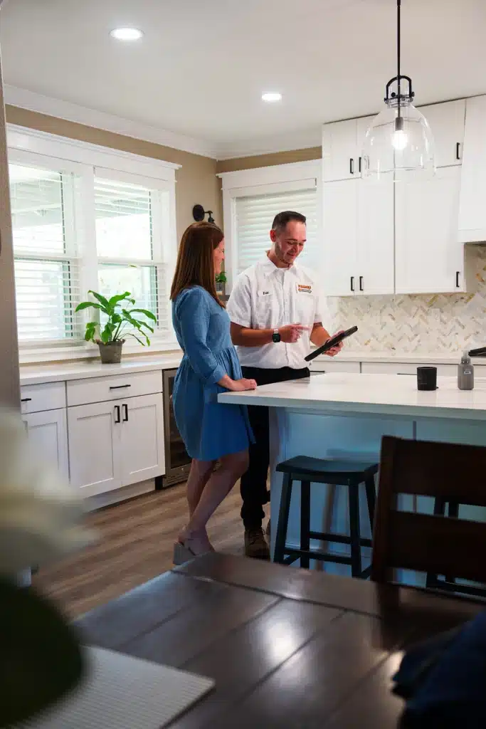 Pearce technician helping homeowner
