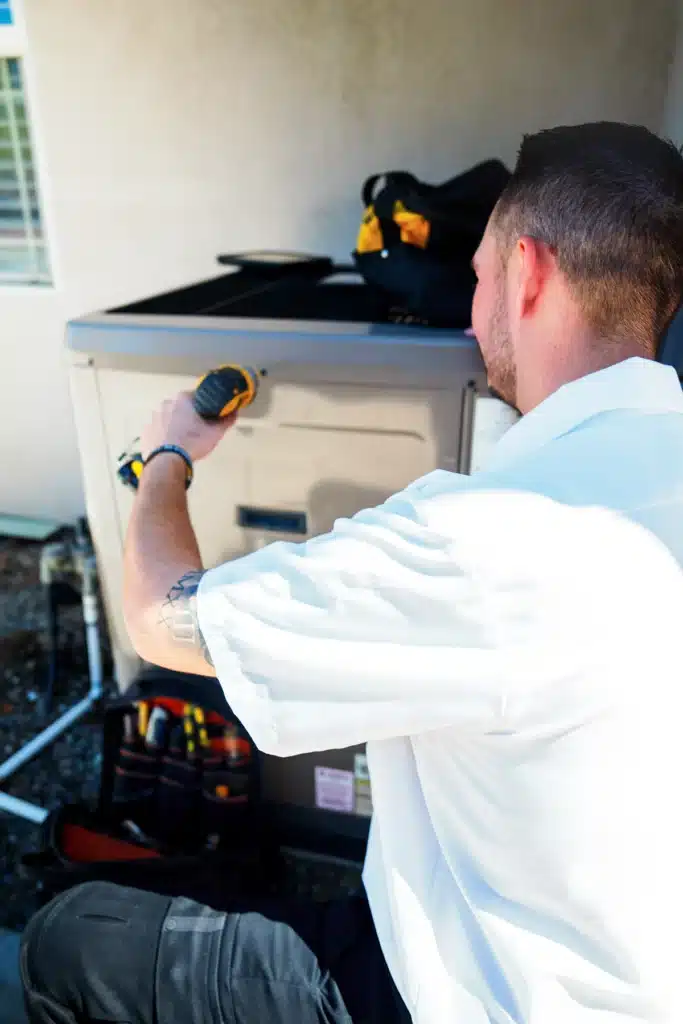 Pearce technician servicing unit in home